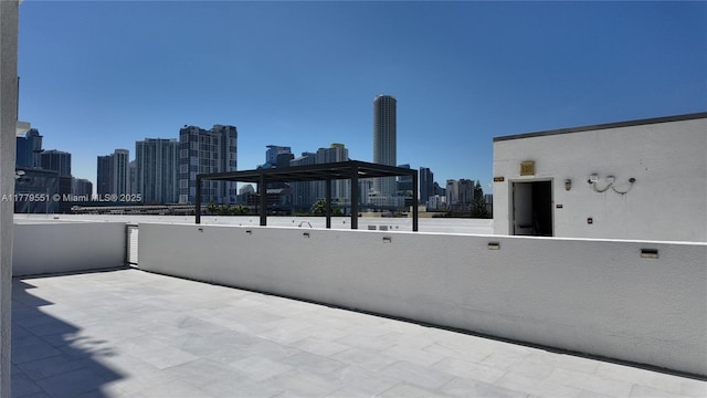 10 SW S River Dr Unit 610, Miami, FL 33130 - view of patio featuring a skyline view