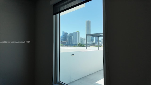 10 SW S River Dr Unit 610, Miami, FL 33130 - spare room with plenty of natural light and a skyline view