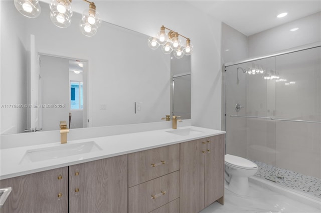 full bathroom featuring double vanity, a sink, and a stall shower