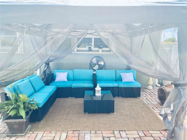 428 N Crescent Dr, Hollywood, FL 33021 - view of patio / terrace featuring an outdoor living space and fence