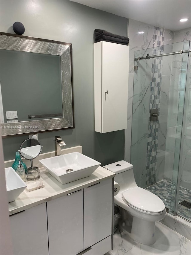 428 N Crescent Dr, Hollywood, FL 33021 - bathroom with a marble finish shower, marble finish floors, toilet, vanity, and recessed lighting