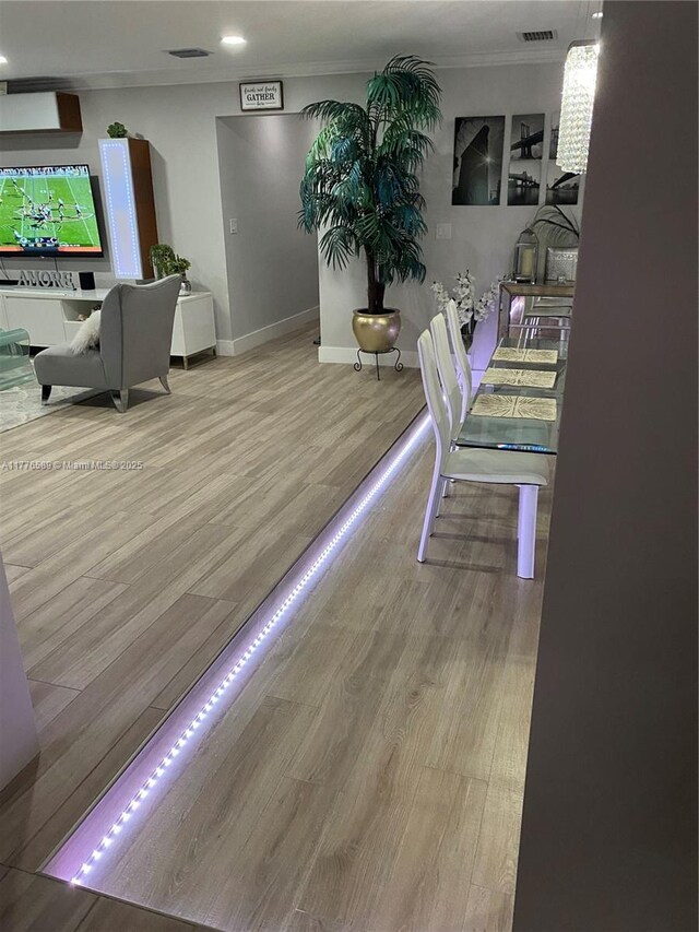 428 N Crescent Dr, Hollywood, FL 33021 - dining room featuring crown molding, wood finished floors, recessed lighting, and baseboards