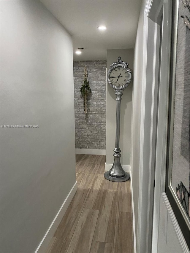 428 N Crescent Dr, Hollywood, FL 33021 - hall featuring baseboards, wood finished floors, and recessed lighting