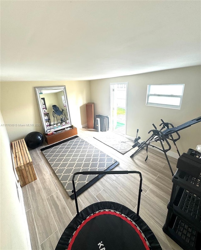 428 N Crescent Dr, Hollywood, FL 33021 - living area featuring wood finished floors and baseboards
