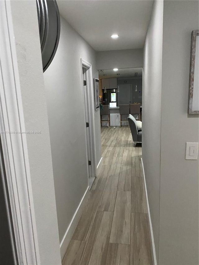 428 N Crescent Dr, Hollywood, FL 33021 - corridor with wood finished floors, baseboards, and recessed lighting