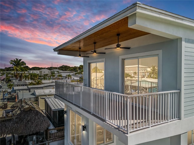 deck at dusk with ceiling fan