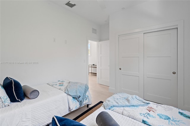 84745 Old Hwy Unit 1, Islamorada, FL 33036 - bedroom featuring light wood finished floors and a closet