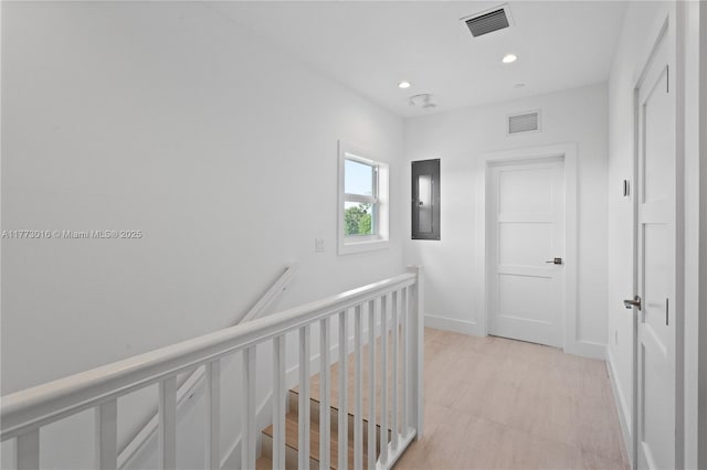 84745 Old Hwy Unit 1, Islamorada, FL 33036 - corridor with an upstairs landing, recessed lighting, and electric panel