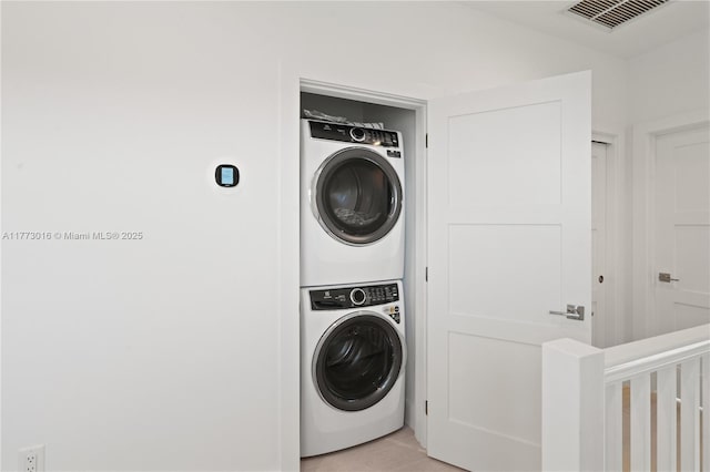 84745 Old Hwy Unit 1, Islamorada, FL 33036 - laundry area with stacked washer / drying machine