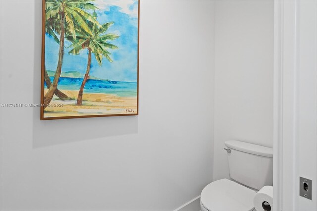 84745 Old Hwy Unit 1, Islamorada, FL 33036 - bathroom featuring toilet and baseboards