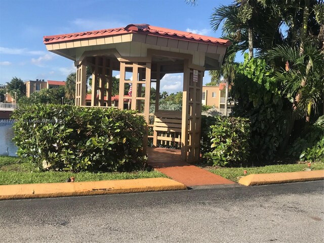 5112 NW 79th Ave Unit 201, Doral, FL 33166 - exterior space featuring a tiled roof