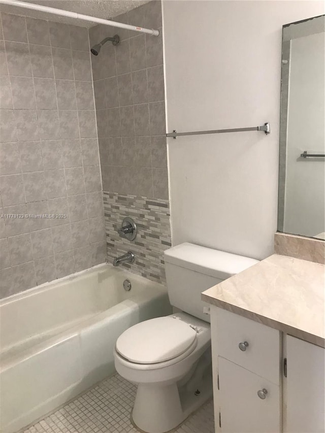 5112 NW 79th Ave Unit 201, Doral, FL 33166 - bathroom featuring tile patterned floors, toilet, shower / bathing tub combination, and vanity