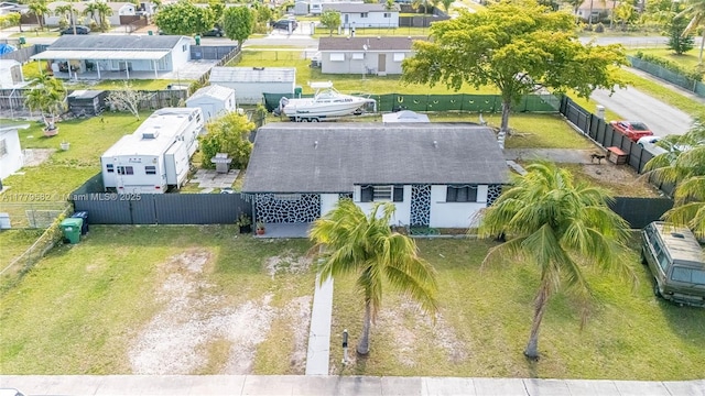 birds eye view of property with a residential view