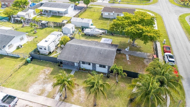 birds eye view of property with a residential view