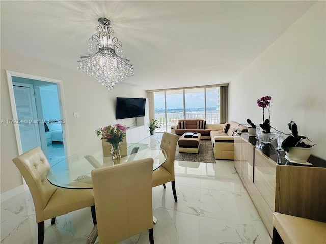 18071 Biscayne Blvd Unit 1503, Aventura, FL 33160 - dining area with light marble finish floors, floor to ceiling windows, and a chandelier