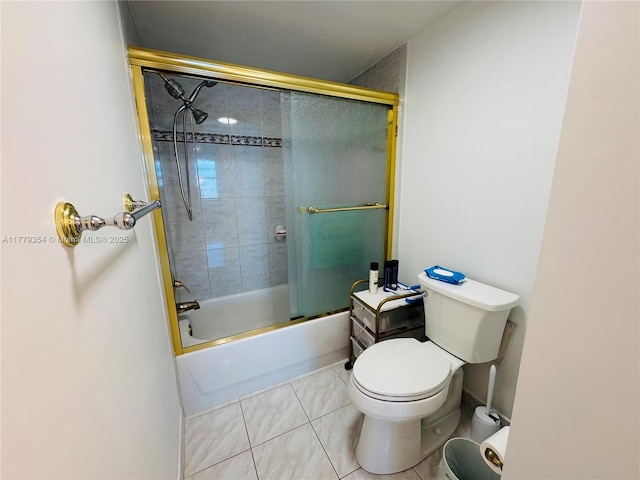 18071 Biscayne Blvd Unit 1503, Aventura, FL 33160 - bathroom featuring tile patterned floors, toilet, and combined bath / shower with glass door