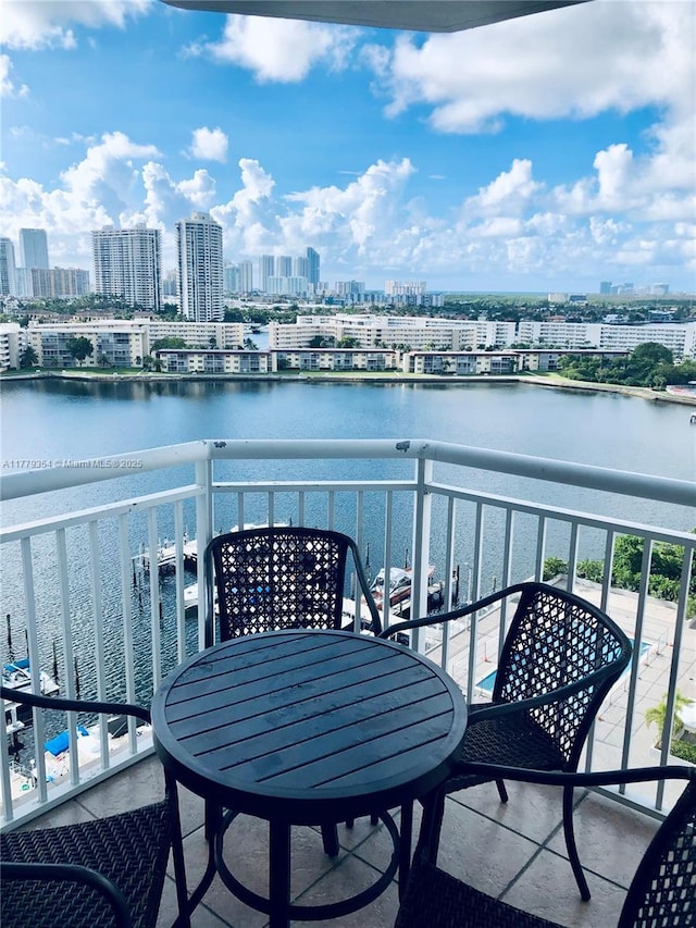 18071 Biscayne Blvd Unit 1503, Aventura, FL 33160 - balcony with a skyline view, a water view, and outdoor dining area