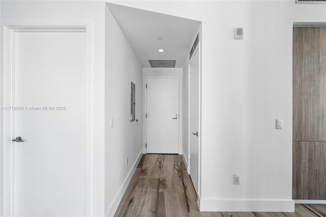 2900 NE 7th Ave Unit 1609, Miami, FL 33137 - hallway with wood finished floors and electric panel