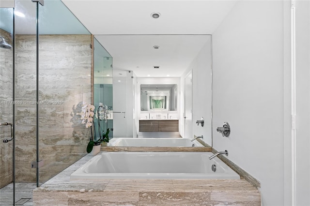2900 NE 7th Ave Unit 1609, Miami, FL 33137 - full bathroom featuring a garden tub, vanity, and a shower with door