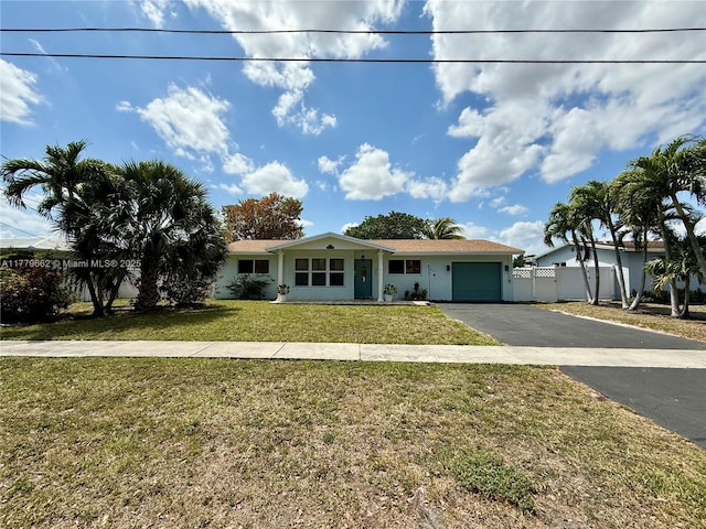 1625 E River Dr, Margate, FL 33063 - single story home with driveway and an attached garage