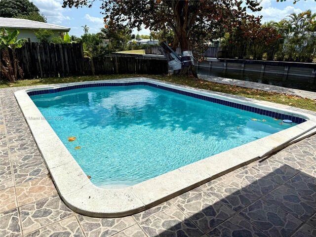 1625 E River Dr, Margate, FL 33063 - view of pool featuring a fenced backyard
