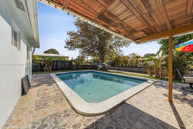 1625 E River Dr, Margate, FL 33063 - view of pool featuring a patio area and a fenced backyard
