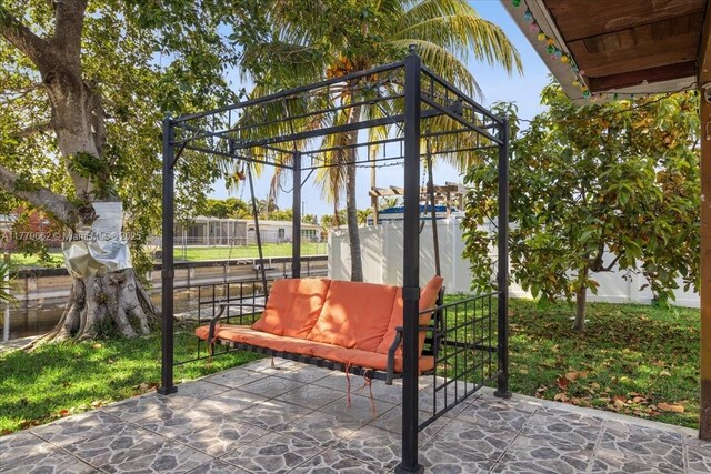 1625 E River Dr, Margate, FL 33063 - view of patio featuring a fenced backyard, a grill, and outdoor dining space