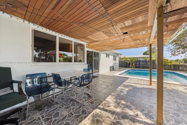 1625 E River Dr, Margate, FL 33063 - view of patio / terrace with grilling area and fence
