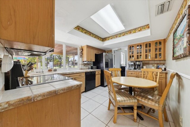 1625 E River Dr, Margate, FL 33063 - dining room featuring light tile patterned floors