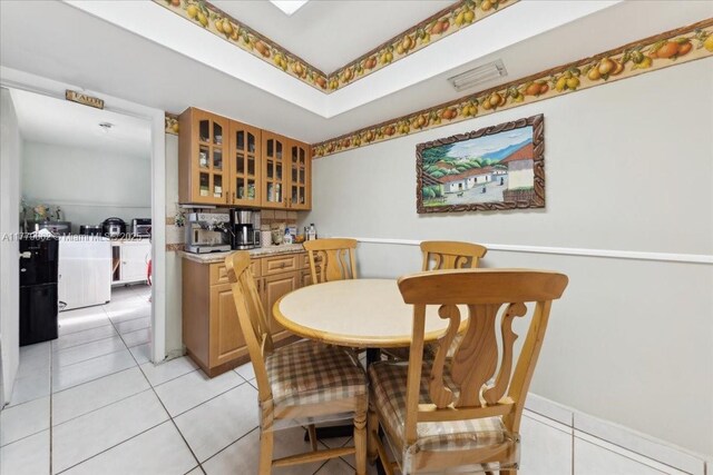 1625 E River Dr, Margate, FL 33063 - kitchen featuring stainless steel appliances, light countertops, backsplash, and light tile patterned floors