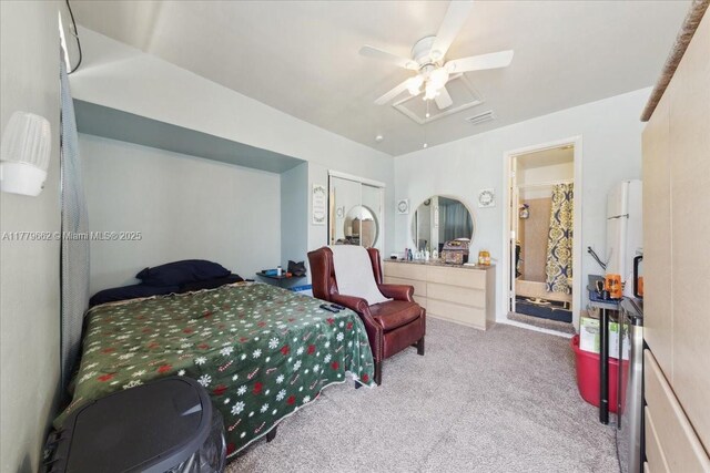 1625 E River Dr, Margate, FL 33063 - bedroom with carpet flooring, multiple closets, lofted ceiling, ceiling fan, and freestanding refrigerator