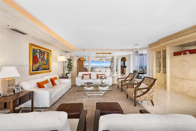 21150 NE 38th Ave Unit 2106, Aventura, FL 33180 - living area with arched walkways and visible vents