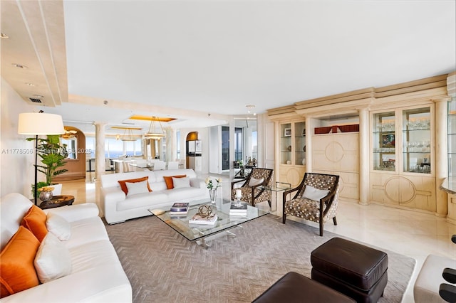 21150 NE 38th Ave Unit 2106, Aventura, FL 33180 - living area featuring visible vents and decorative columns