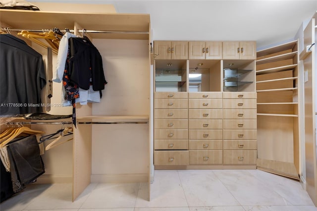 21150 NE 38th Ave Unit 2106, Aventura, FL 33180 - spacious closet featuring light tile patterned floors