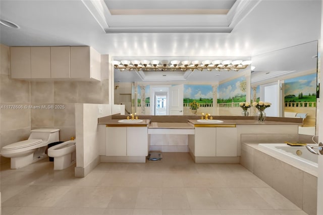 21150 NE 38th Ave Unit 2106, Aventura, FL 33180 - bathroom with toilet, a bidet, a tray ceiling, vanity, and a garden tub