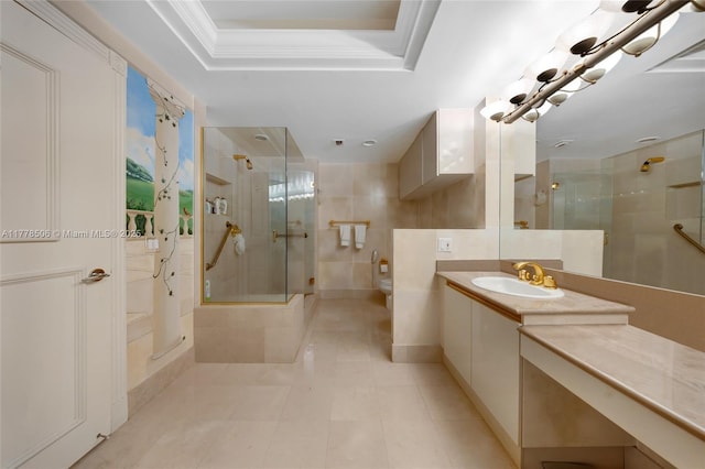 21150 NE 38th Ave Unit 2106, Aventura, FL 33180 - bathroom featuring a shower stall, a tray ceiling, vanity, ornamental molding, and toilet