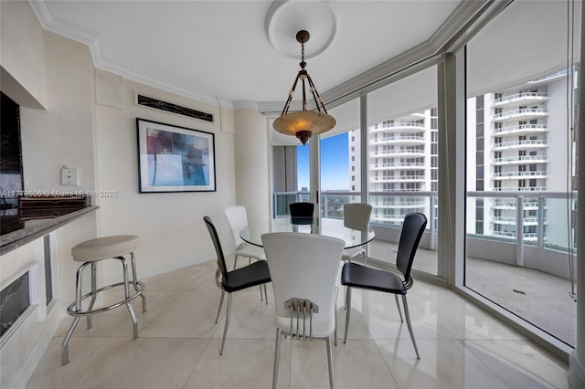21150 NE 38th Ave Unit 2106, Aventura, FL 33180 - dining space with plenty of natural light, baseboards, ornamental molding, and light tile patterned flooring