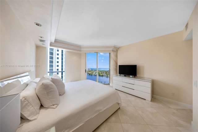 21150 NE 38th Ave Unit 2106, Aventura, FL 33180 - bedroom featuring visible vents, baseboards, access to outside, and light tile patterned floors