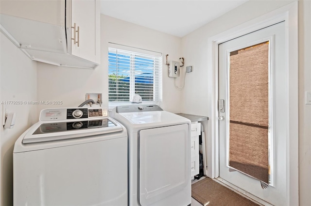 5911 NE 21st Ter, Fort Lauderdale, FL 33308 - washroom with cabinet space and washing machine and dryer