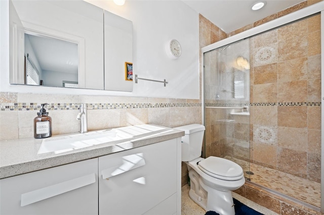 5911 NE 21st Ter, Fort Lauderdale, FL 33308 - full bath featuring vanity, toilet, a stall shower, and tile walls
