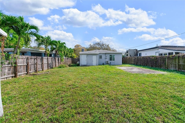 view of yard with a fenced backyard and a patio area