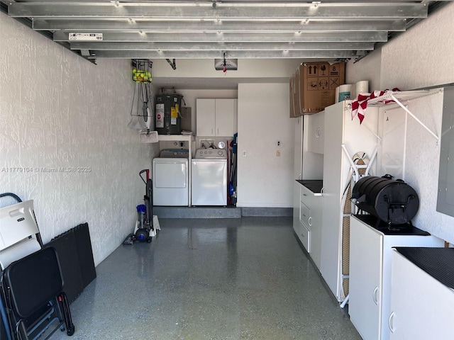 garage featuring separate washer and dryer and water heater