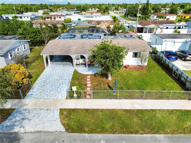 birds eye view of property with a residential view