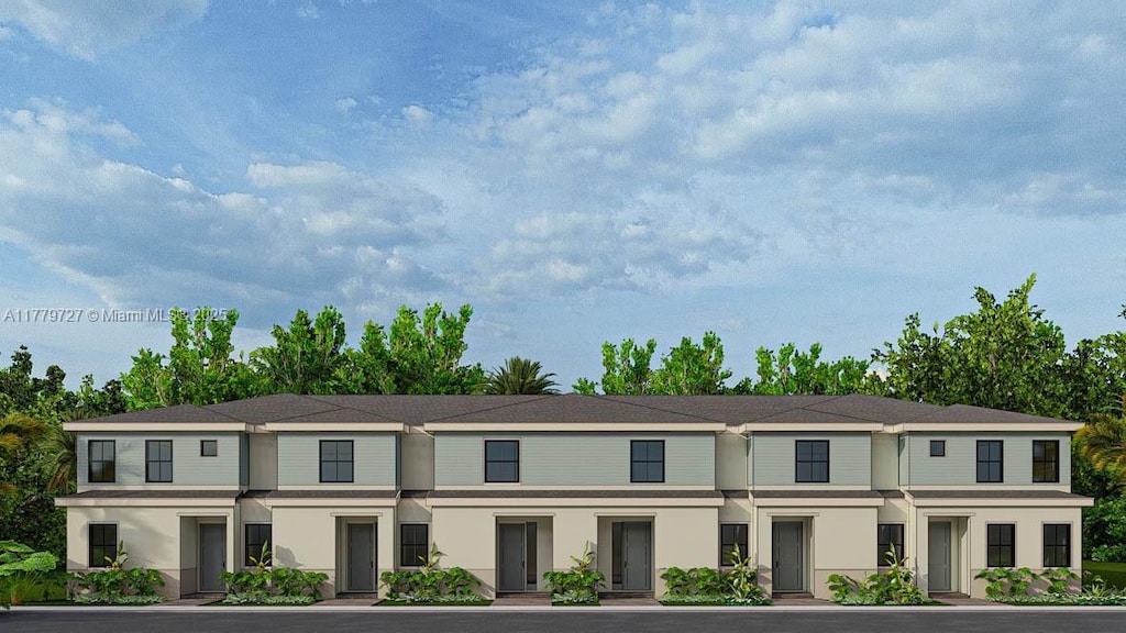 view of front of property featuring stucco siding