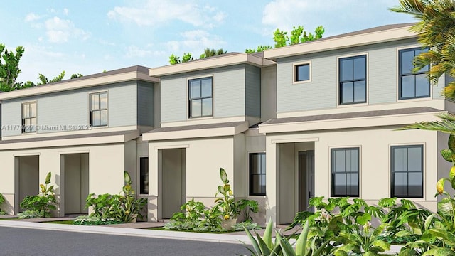 view of front of property featuring stucco siding