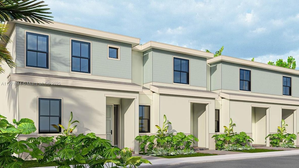 view of front of home with stucco siding
