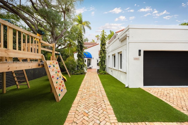 view of yard with a garage