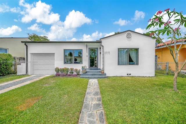 2019 SW 17th Ter, Miami, FL 33145 - view of front of home with a garage, driveway, and stucco siding