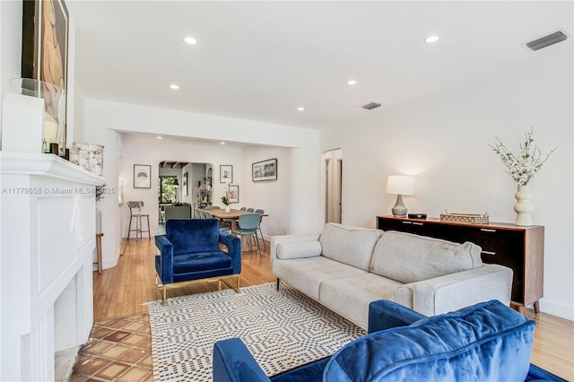 2019 SW 17th Ter, Miami, FL 33145 - living area with recessed lighting, arched walkways, and light wood-type flooring