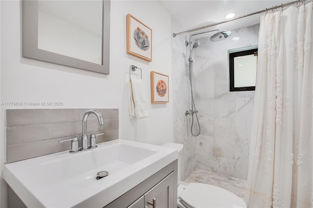 2019 SW 17th Ter, Miami, FL 33145 - bathroom with a marble finish shower, vanity, toilet, and backsplash